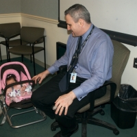 Daddy and Sara in the conference room