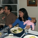 Lena relaxes at dinner, while big brother Michael is absorbed with his Daddy (Joe)