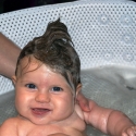 In the bath, with her stylish mohawk!