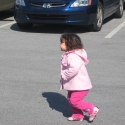 Julia plays in the parking lot