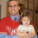 Not missing a chance to wear his Phillies jersey over a suit, Daddy gets ready to go to work!