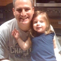 Prior to heading to the chalk-talk breakfast, Peanut poses with Daddy