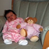 Sara and her pink bear make a good pair