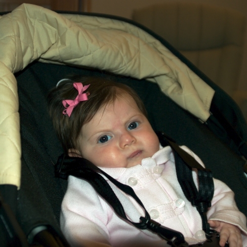 Sara in her newly reconfigured chair stroller