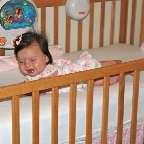 Tummy time in her crib