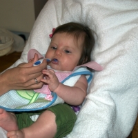 It's pretty clear that between the cereal and the spoon, she prefers the spoon!