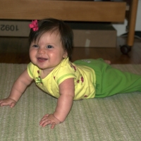 Playing on her rug